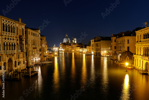 Night view of Santa Maria della Salute Church from the Accademia Bridge, Venice, Italy © Matteo