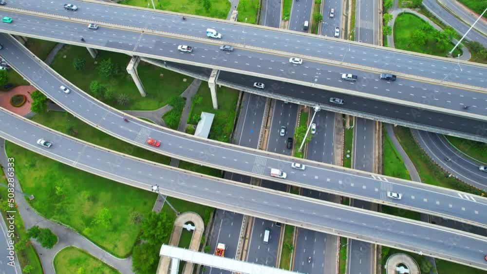 4K : Aerial view and top view of traffic on city. Expressway with car lots. Beautiful aerial top view from drone. Nonthaburi, thailand.
