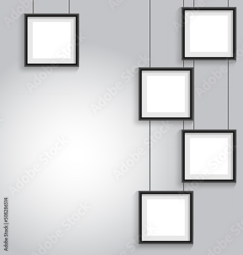 Blank hanging frames. Pictures, photo frames on light wall. Contemporary vector interior
