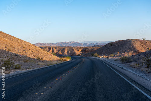 Driving Downhill on a Two way Road in Nevada Early in the Monring