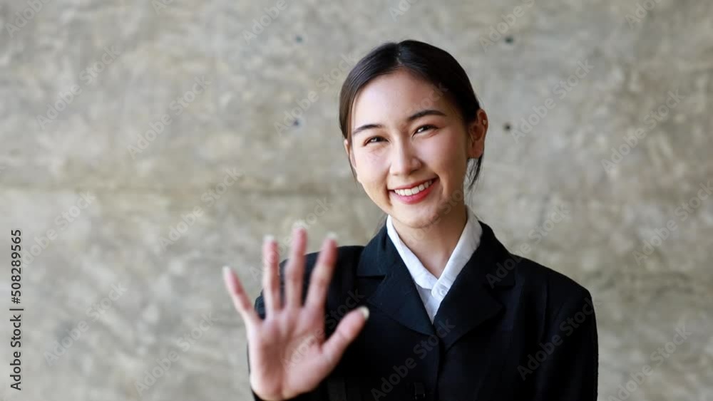 Close-up of smiling Asian beautiful woman, smiling Asian businesswoman happily looking at camera businesswoman portrait business beautiful modern manager pretty slow motion, 4k. Close-up of smiling Asian beautiful woman, smiling Asian businesswoman happily looking at camera businesswoman portrait business beautiful modern manager pretty slow motion, 4k.
