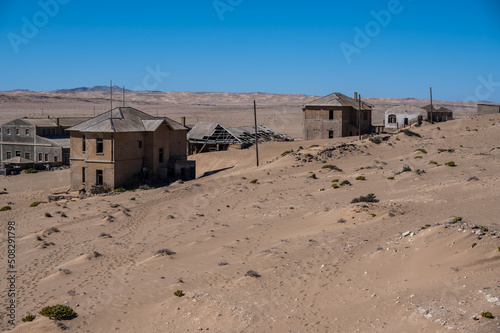 abandoned house filled with desert sand in kolmanskop,namibia © Andreas