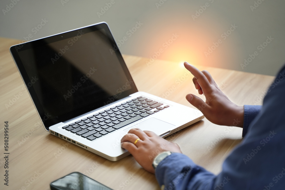 a businessman using a computer to manage documents online document database and digital file storage system or save the software database technology file access access to document files.