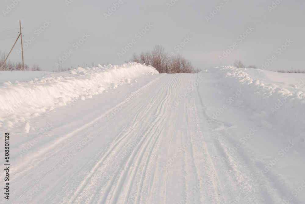 winter landscape rural road covered with snow