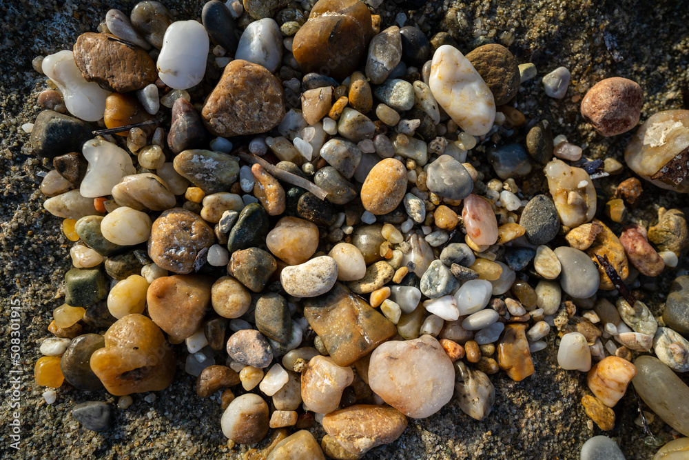 Hundred colourful beach pebbles in Afitos, Greece Hundred colourful beach pebbles in Afitos, Greece