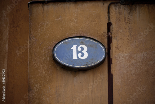 number plate on the wall