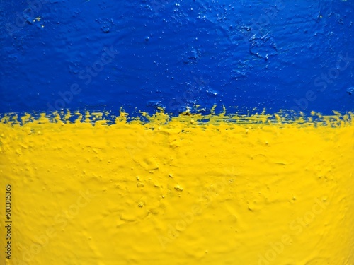 yellow-blue texture on concrete surface
