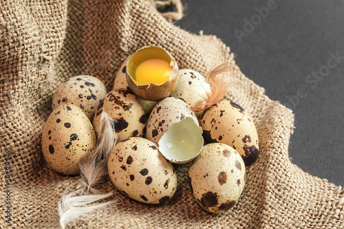 Fresh quail eggs on a dark background