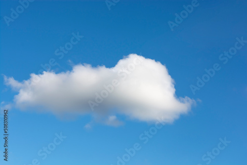 A white lonely cloud in the blue sky. Copy spase.
