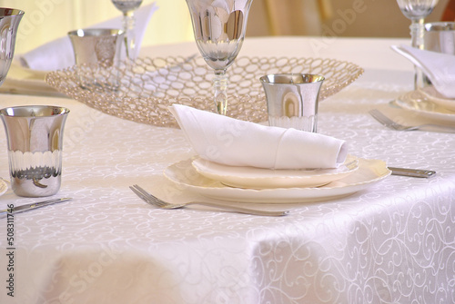   able setting in beige shades in a restaurant