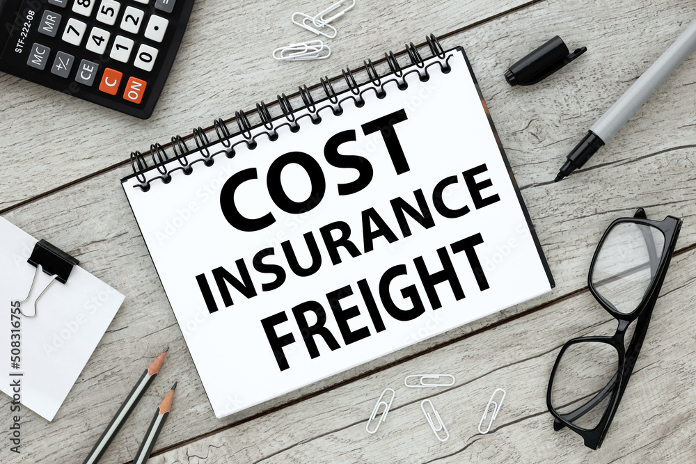 CIF. Cost Insurance Freight, text on an open notepad on a light table CIF. Cost Insurance Freight, text on an open notepad on a light table