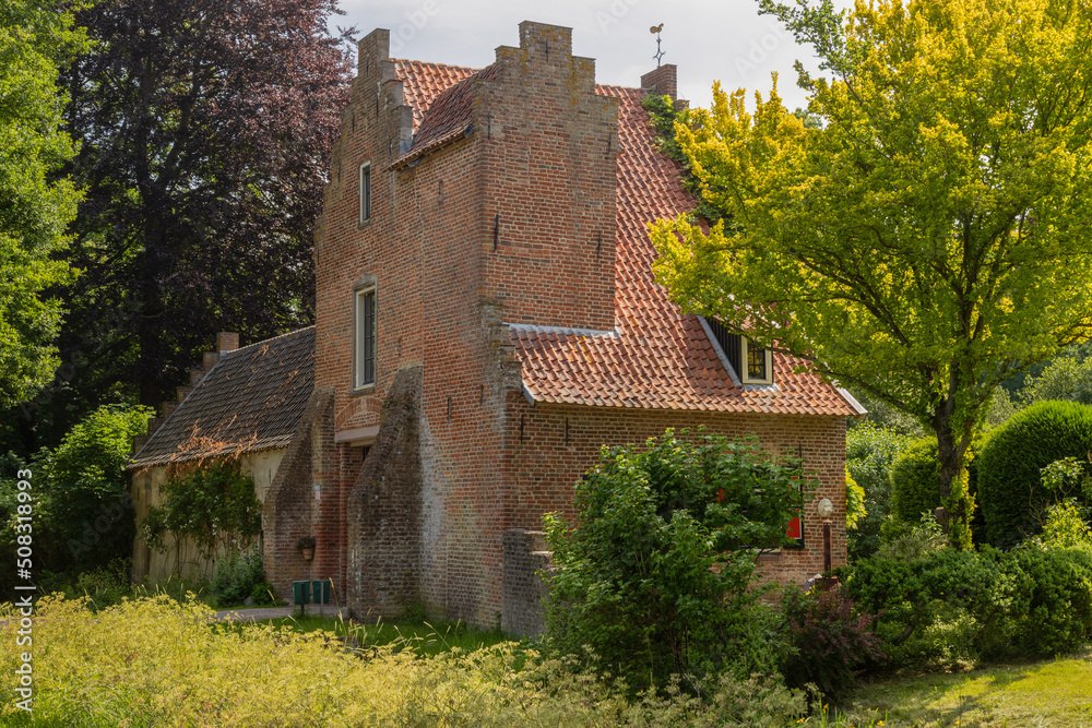 14th century gatehouse of Rhijnestein Castle in the rural village of Cothen.