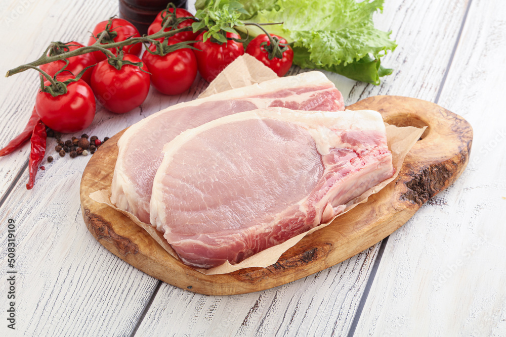 Raw pork t-bone steak for grill