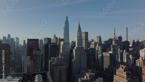 Aerial view of high rise buildings in midtown. One Vanderbilt and Chrysler building in afternoon sun. Manhattan, New York City, USA photo
