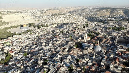 Aerial view over Jerusalem old city and golden al aqsa mosque
Drone view from east Jerusalem old city and golden dome of the rock, may 2022, israel
 photo