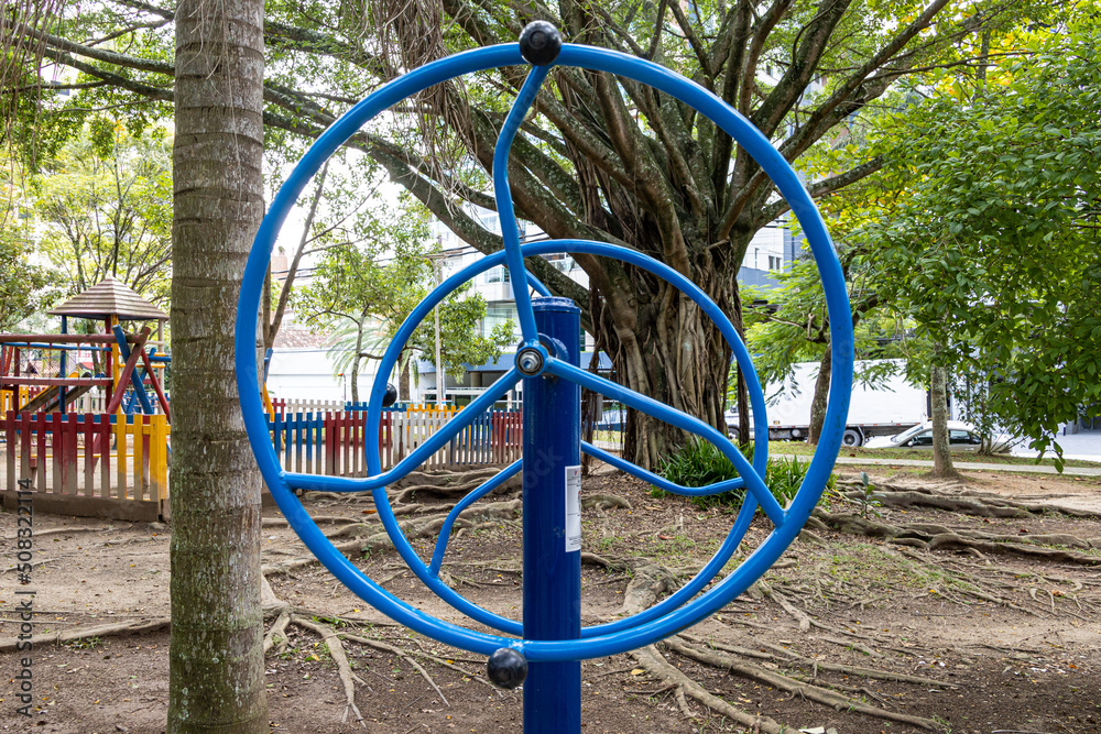 Metal exercise machines (sports) for the elderly in a park in Brazil. Leg trainers. Hand trainers. Trainers for all parts of the body. Sports for the elderly. Sports for old people.