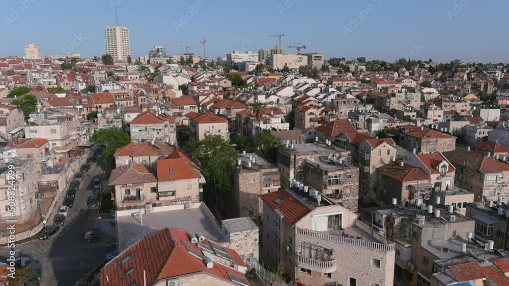 Jerusalem center with red rooftops and tall buildings, aerial view
Drone view from center of Jerusalem at noon, israel, 2022
Jerusalem center with red rooftops and tall buildings, aerial view
Drone view from center of Jerusalem at noon, israel, 2022