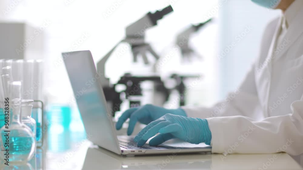 scientist working on computer scientist working on computer