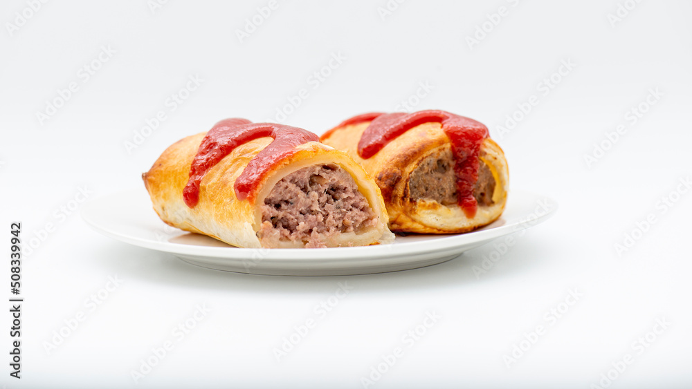 Fresh baked golden flaky beef sausage roll Fresh baked golden flaky beef sausage roll