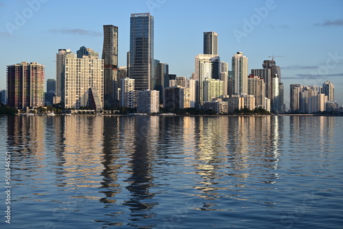 Skyline of City of Miami, Florida reflected in calm water of Biscayne Bay on clear sunny morning. © Francisco