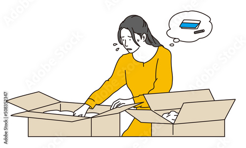 荷物の中なら大事なものを探す女性