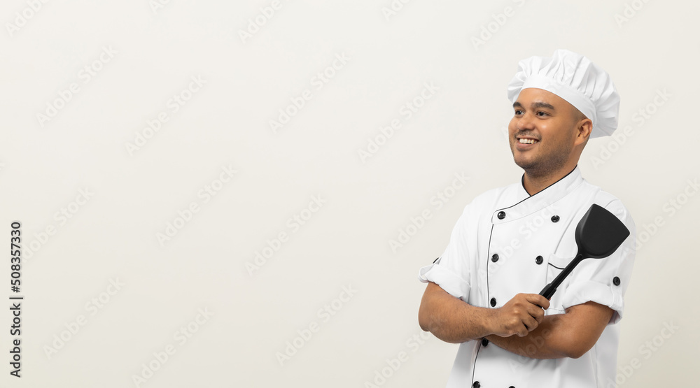 Young handsome asian man chef in uniform standing with turner kitchen utensils various gesture action on isolated background. Cooking man Occupation chef People in kitchen restaurant and hotel. Young handsome asian man chef in uniform standing with turner kitchen utensils various gesture action on isolated background. Cooking man Occupation chef People in kitchen restaurant and hotel.
