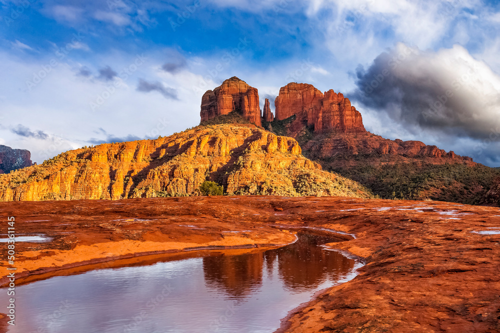Cathedral Rock reflecting off a pool of water in Sedona, Arizona