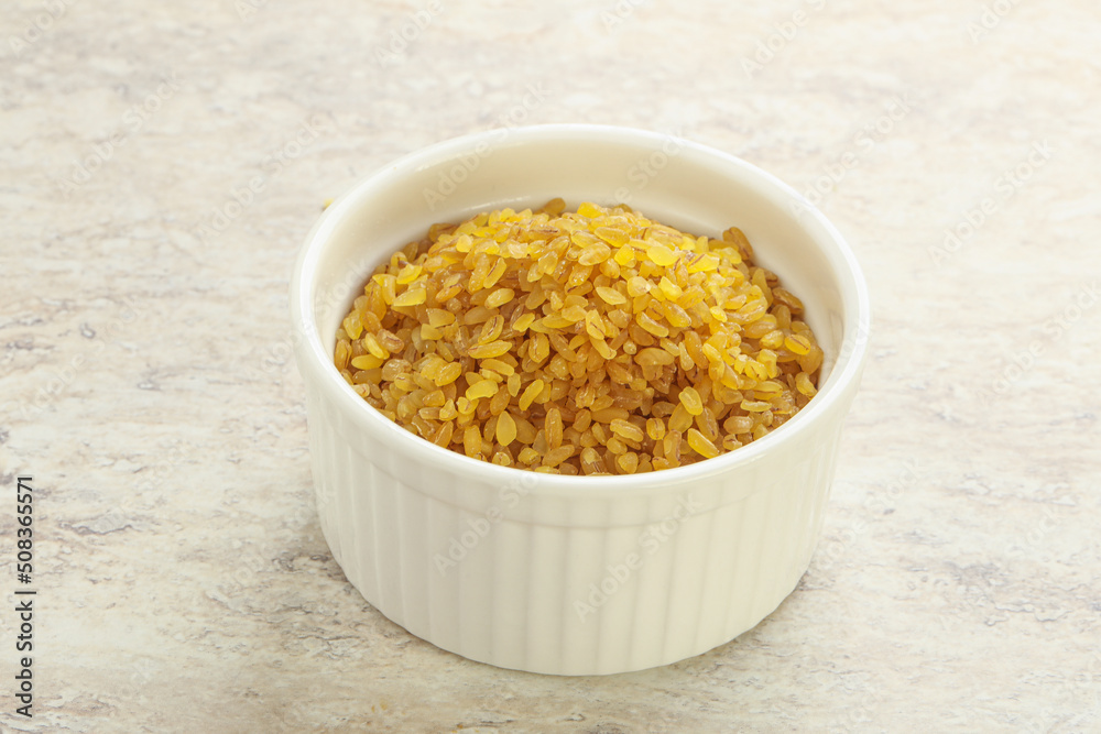 Raw bulgur in the bowl Raw bulgur in the bowl