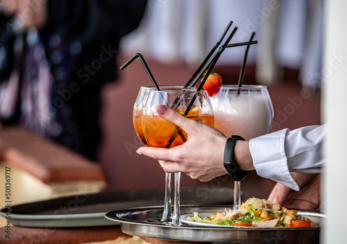 still life with glasses with cocktails on a white table close-up