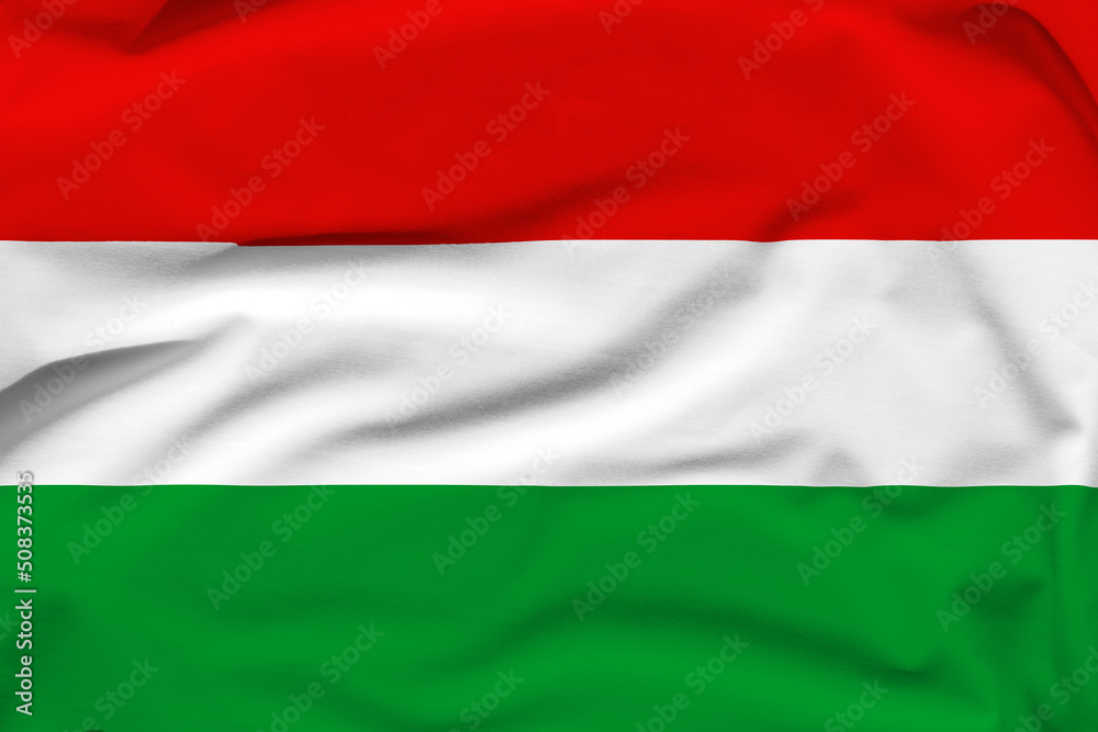 Hungary national flag, folds and hard shadows on the canvas