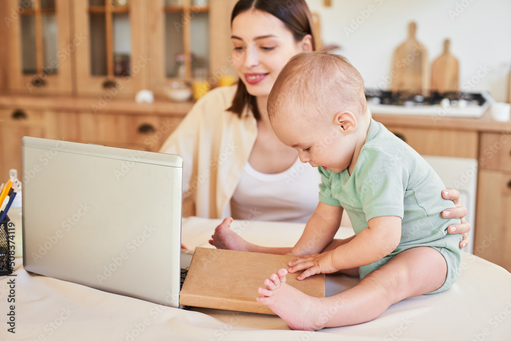 Inventive working mom with baby, multitasking in the morning. Inventive working mom with baby, multitasking in the morning.