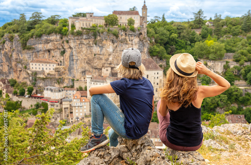 young man and girl enjoying City of Rocamadour- France