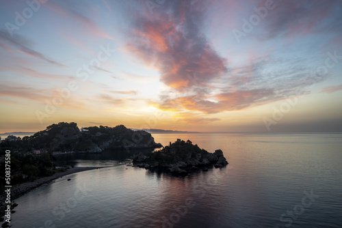 Sunrise over Isola Bella island near Taormina  Sicily  Italy.