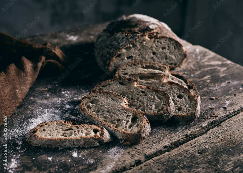 Fresh bread on wooden table Fresh bread on wooden table