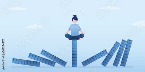 Risk management. Economic crash, financial collapse. Businesswoman meditating for relax. Reduce stress and eliminate distraction. Confident manager meditating in lotus yoga pose on domino.
