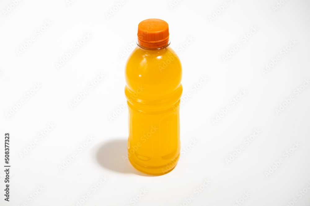 Bottle of fresh orange drink on white background Bottle of fresh orange drink on white background