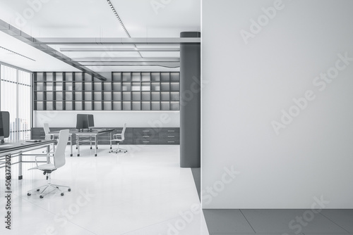 Modern black and white office interior with desk partition and equipment, window with city view and daylight, blank mock up place on wall. Law and legal concept. 3D Rendering.