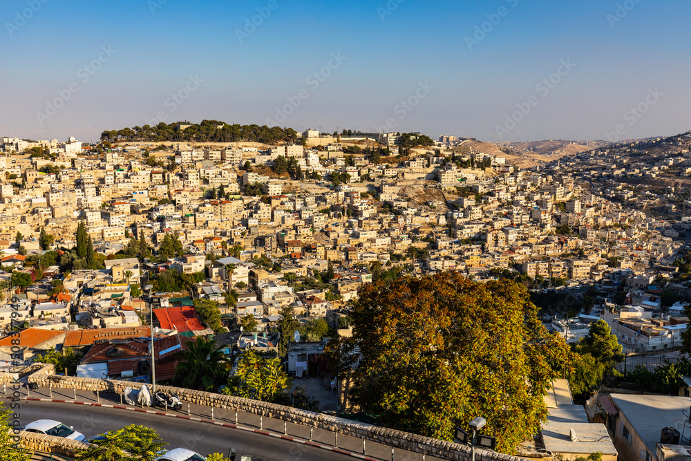 Panorama of Mount of Olives with Siloam village over ancient City of David quarter seen from south wall of Temple Mount in Jerusalem Old City in Israel