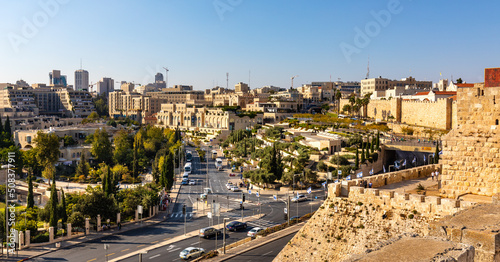 Walls of Tower Of David citadel and Old City over Jaffa Gate and Hativat Yerushalayim street with Mamilla quarter of Jerusalem in Israel photo
