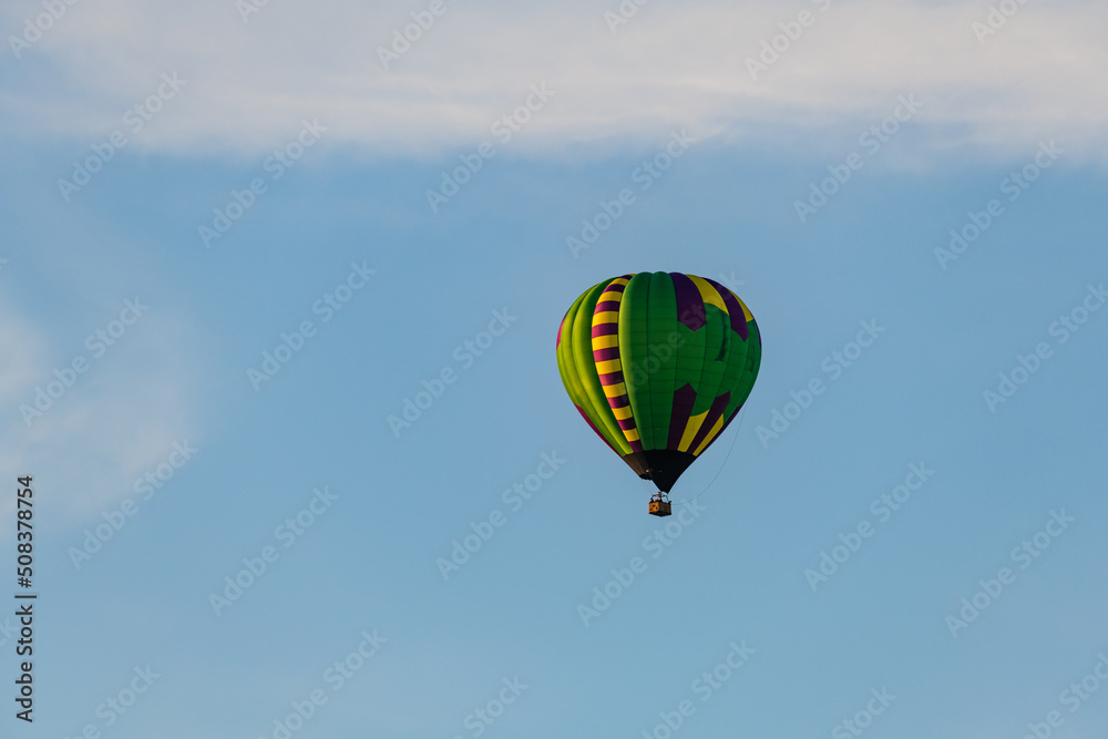 Hot air balloons floating in the air over the City of Burlington, WI Hot air balloons floating in the air over the City of Burlington, WI