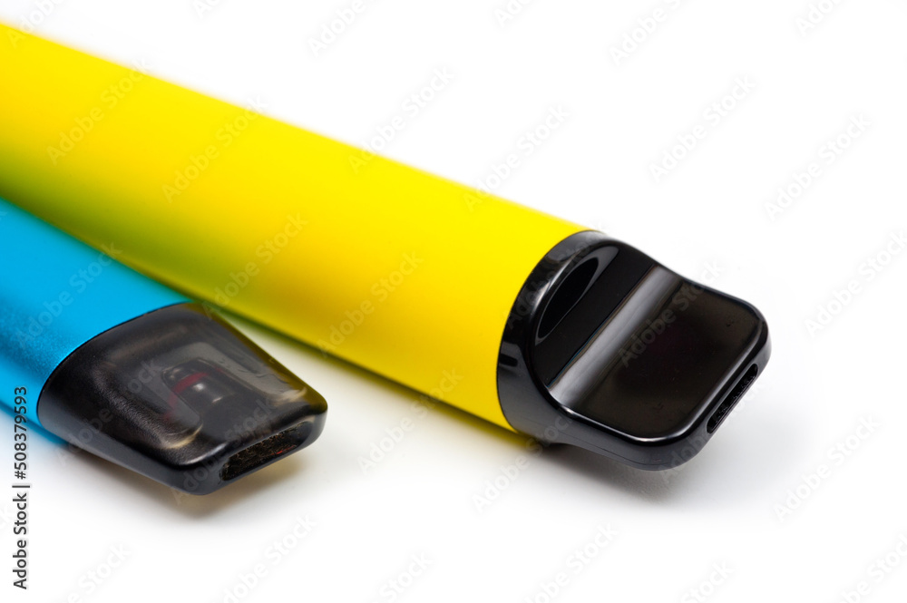 Two electronic cigarettes disposable and refillable with a replaceable cartridge in a blue and yellow body, photographed against a white background