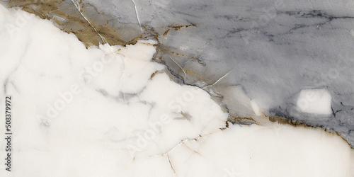 Blanco tranco marble stone background dark golden-grey streaks. white marble glazy and smooth surface. polishing white marble stone that is used to wall tile claddings, flooring, wainscot, vanity.