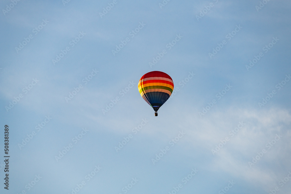 Hot air balloons floating in the air over the City of Burlington, WI Hot air balloons floating in the air over the City of Burlington, WI
