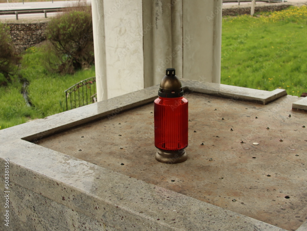 Lantern for a candle on a dry marble tray in the chapel for the source of the Moskva River near the M1 highway Lantern for a candle on a dry marble tray in the chapel for the source of the Moskva River near the M1 highway