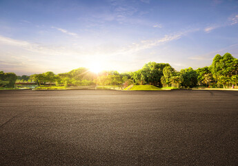 Empty street garden at and tarmac floor. sunrise.