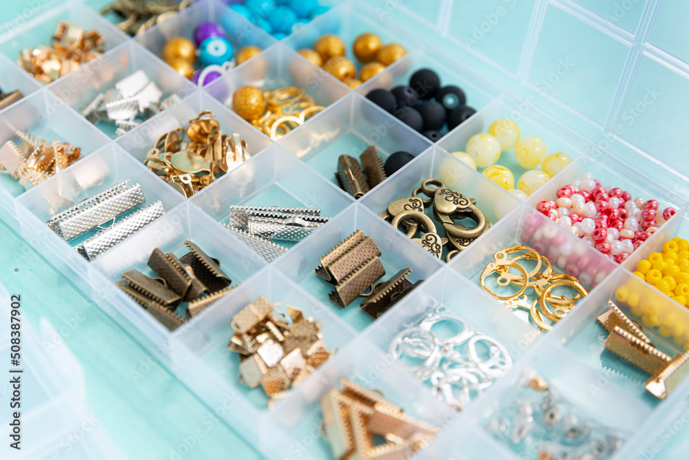 beads, beads with letters and words, a place for handmade on a blue background, multicolored beads, everything for handmade, hobby time beads, beads with letters and words, a place for handmade on a blue background, multicolored beads, everything for handmade, hobby time
