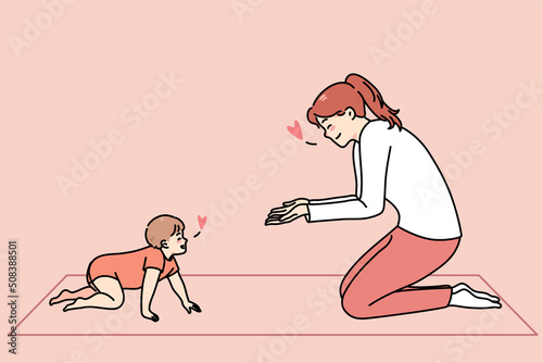 Loving happy young mother play with little toddler crawling at home. Smiling caring mom have fun teach baby infant walking make first steps. Motherhood. Vector illustration. 