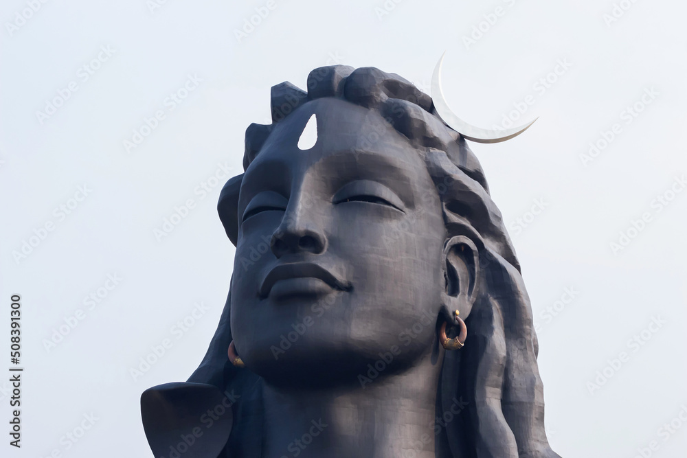 Portrait View of Adiyogi Shiva Statue, 34 meter tall statue designed by Sadhguru Jaggi Vasudev, Inaugurated in 2017. Located  at Booluvampatti, 35 kms from Coimbatore, Tamilnadu, India