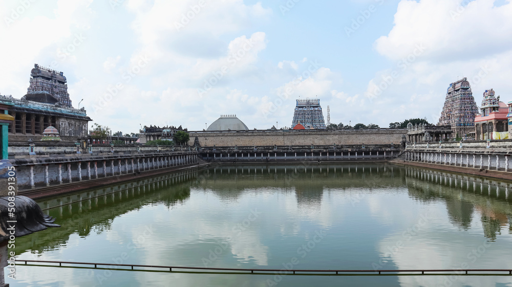 View of Three Gopurams of Nataraja Temple and Shivgangai Teertham water tank, Chidambaram, Tamilnadu, India