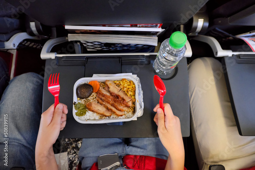 Directly above view of inflight meal onboard a commercial airline photo
